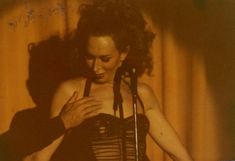 Miss P being caressed on stage by unknown person at the Parliament House, Orlando. Image from Paul Wegman's collection.

For all other purposes please email: floridalgbtqmuseum@gmail.com
