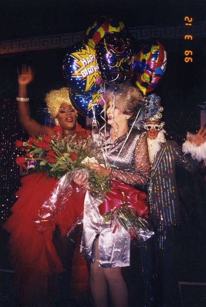 Miss P holding a bouquet of roses and "Happy Birthday" balloons with Darcel Stevens and Bob Taylor as Elton John. He was 54 when image taken. Image from Paul Wegman's collection.

For all other purposes please email: floridalgbtqmuseum@gmail.com