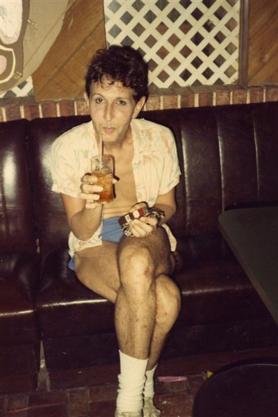 Miss P getting a surprised shot while drinkng in the restaurant at Parliament House, Orlando during rehearsal break.

Images may be used for educational purposes only.
Image credit: Image courtesy of LGBTQ History Museum of Central Florida.
For all other purposes please email: floridalgbtqmuseum@gmail.com