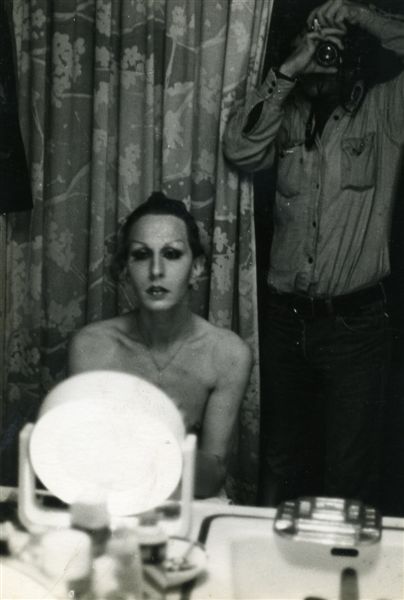  Miss P putting make-up. Dave Wegman comments that due to the surroundings (the sink to the right of the mirror) might be from his room when he was living at the PH, in 228.

Images may be used for educational purposes only.
Image credit: Image courtesy of LGBTQ History Museum of Central Florida.
For all other purposes please email: floridalgbtqmuseum@gmail.com